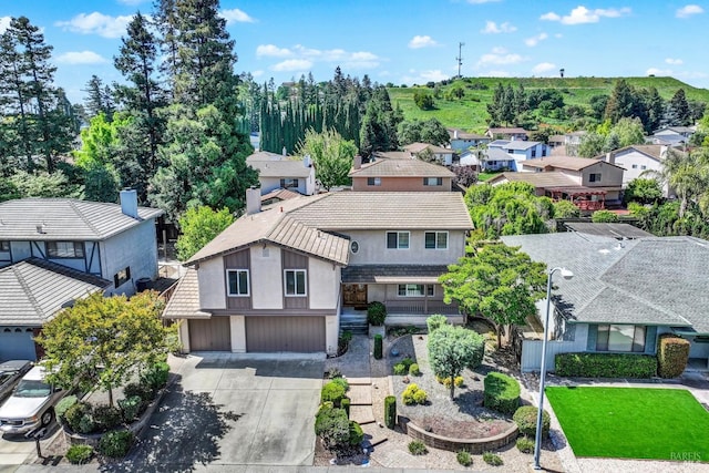 birds eye view of property with a residential view
