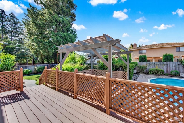wooden terrace with a pergola, a fenced in pool, and a fenced backyard