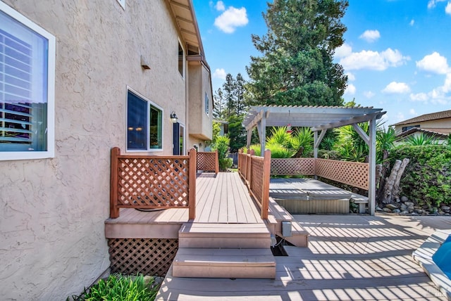 wooden deck featuring a pergola