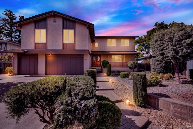 3237 Arroyo Dr, Fairfield, CA 94533 - view of front of house with stucco siding, a garage, driveway, and covered porch