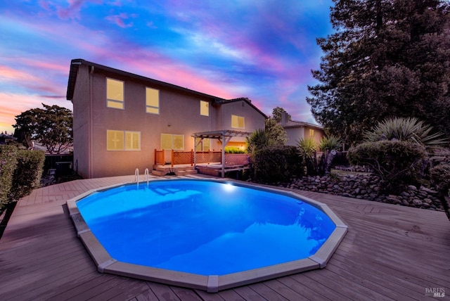 3237 Arroyo Dr, Fairfield, CA 94533 - swimming pool with a pergola, a wooden deck, fence, and a hot tub