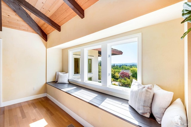 interior space featuring beamed ceiling