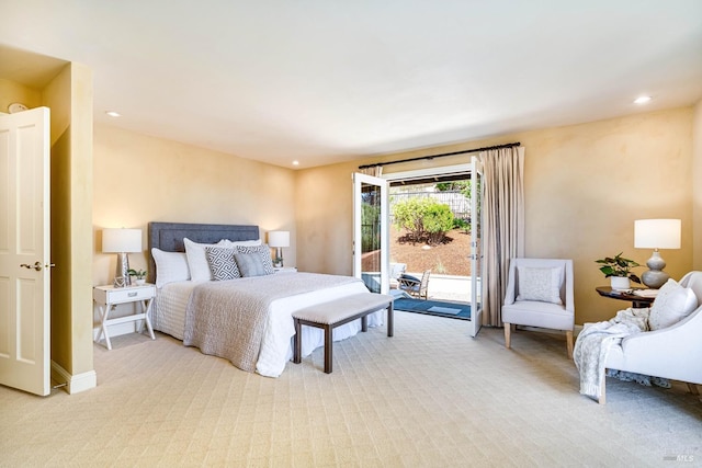 carpeted bedroom featuring recessed lighting and access to exterior