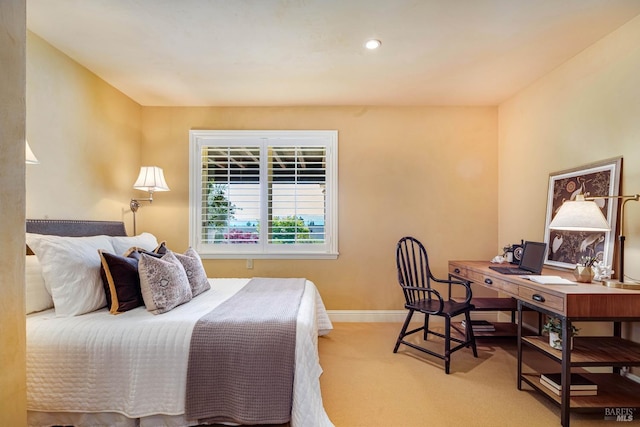 bedroom featuring baseboards and carpet flooring