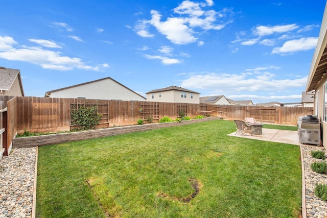 view of yard featuring a patio and a fenced backyard