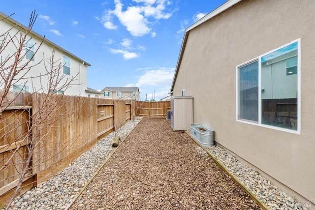 view of yard with a fenced backyard