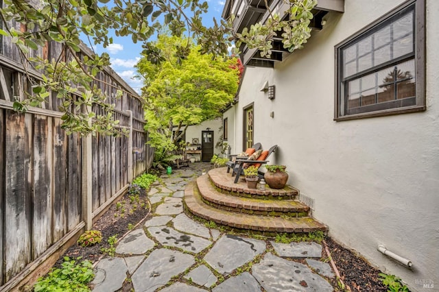 view of patio with fence