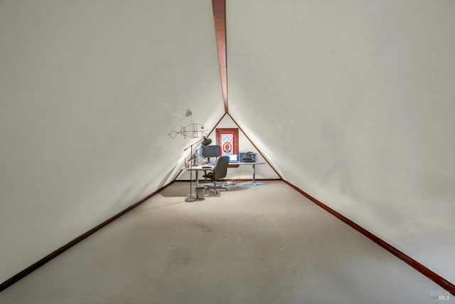 additional living space with carpet and lofted ceiling