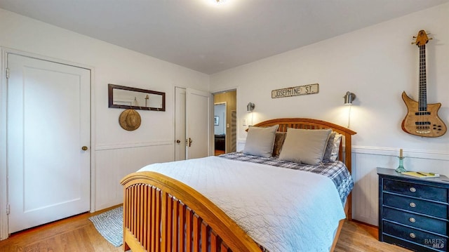 bedroom featuring light wood-style flooring