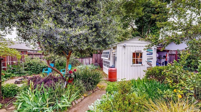 view of shed featuring a fenced backyard