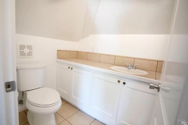 315 Baker St, Petaluma, CA 94952 - bathroom with tile patterned floors, toilet, vanity, and backsplash