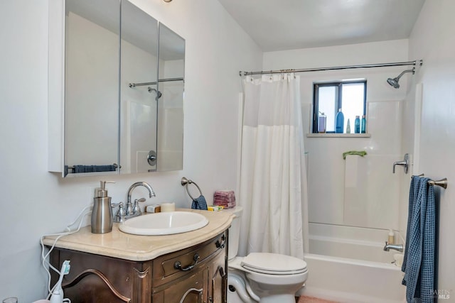 full bath with toilet, shower / bath combo, and vanity
