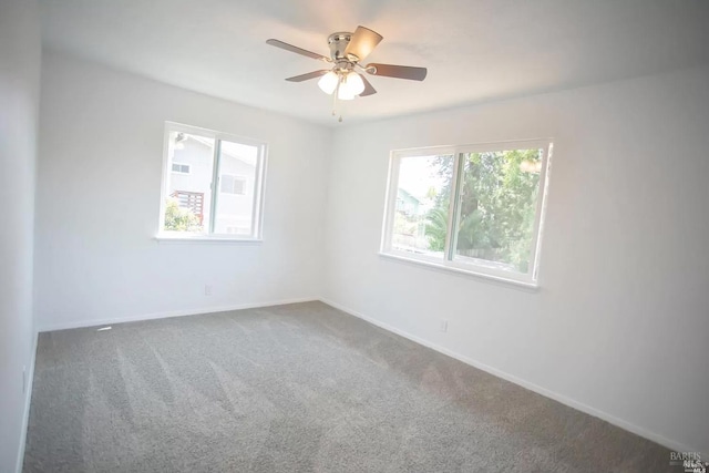 315 Baker St, Petaluma, CA 94952 - unfurnished room with a ceiling fan, baseboards, and dark colored carpet