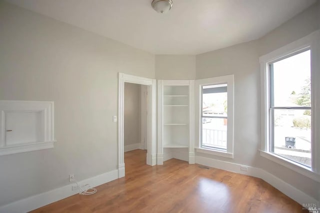 315 Baker St, Petaluma, CA 94952 - unfurnished bedroom with light wood-style flooring, baseboards, and visible vents