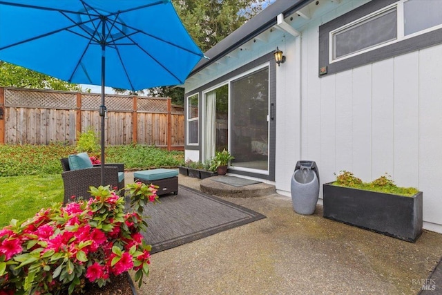 view of patio with fence