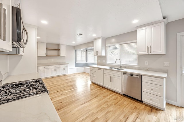 1543 Cunningham Way, Santa Rosa, CA 95403 - kitchen featuring appliances with stainless steel finishes, light wood-type flooring, open shelves, white cabinetry, and recessed lighting