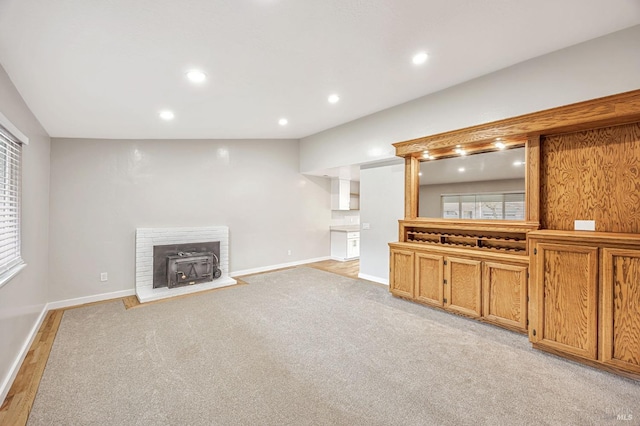 1543 Cunningham Way, Santa Rosa, CA 95403 - unfurnished living room featuring baseboards, recessed lighting, light carpet, and light wood-style floors