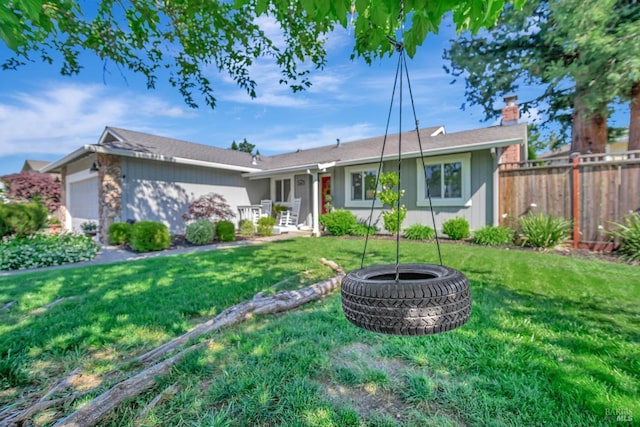 single story home featuring fence, a chimney, a front yard, and an attached garage