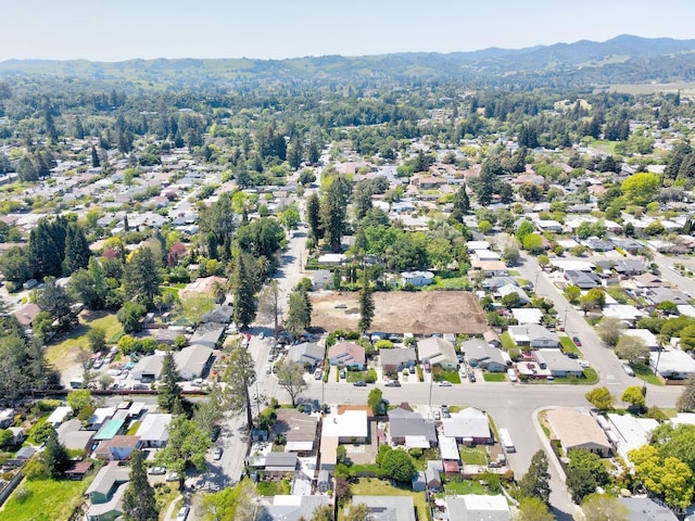 aerial view featuring a mountain view and a residential view