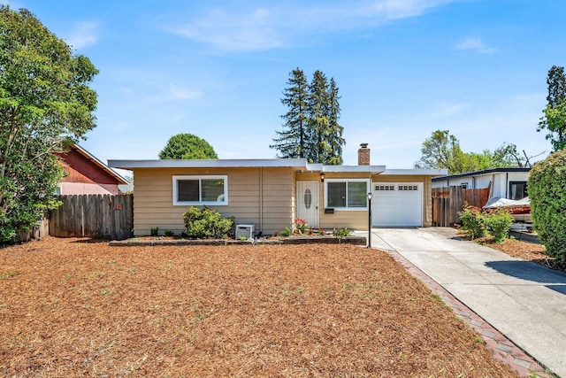 1342 Norma Dr, Napa, CA 94558 - single story home with a chimney, a garage, and concrete driveway