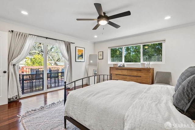 bedroom featuring ornamental molding, hardwood / wood-style floors, and access to exterior
