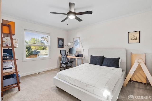 bedroom with crown molding, ceiling fan, carpet, baseboards, and visible vents