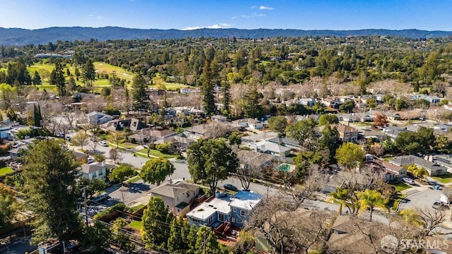 birds eye view of property with a residential view and a mountain view