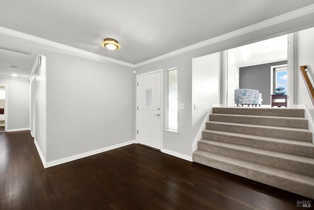entryway featuring stairs, baseboards, and wood finished floors
