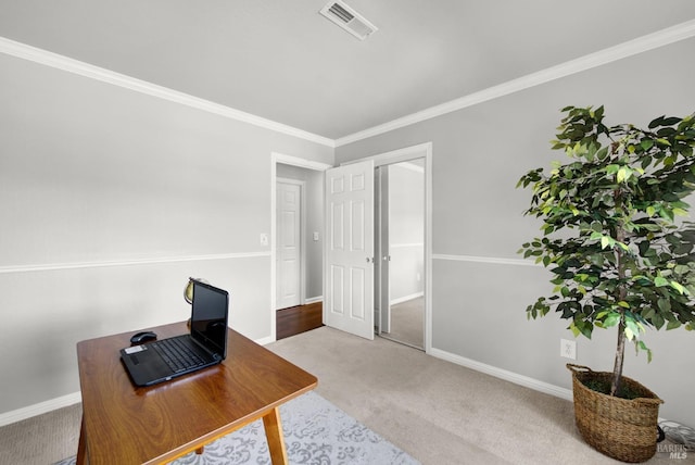 carpeted office space with baseboards, ornamental molding, and visible vents