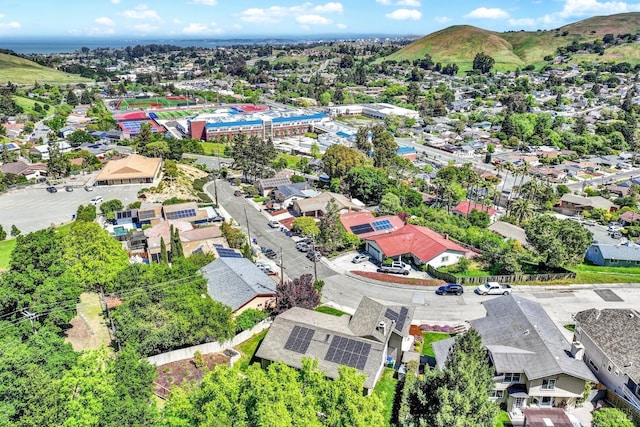 bird's eye view featuring a residential view and a mountain view