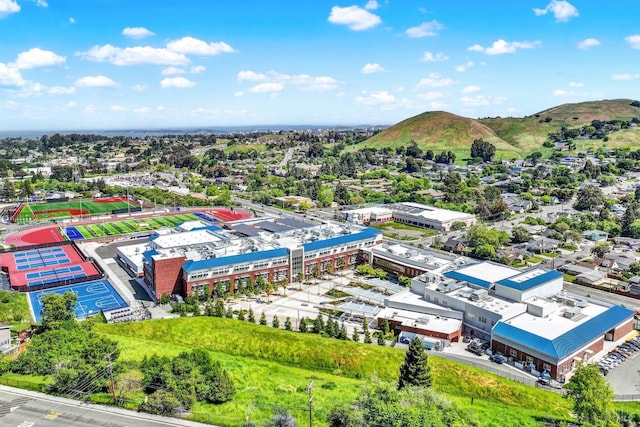 drone / aerial view featuring a mountain view