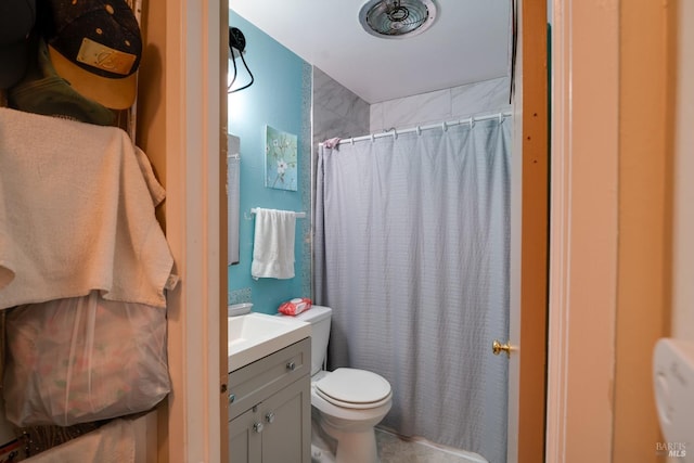 full bath with a shower with shower curtain, toilet, and vanity