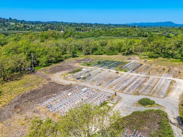 birds eye view of property with a rural view