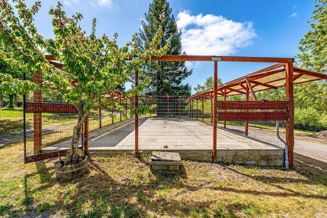 view of patio featuring fence