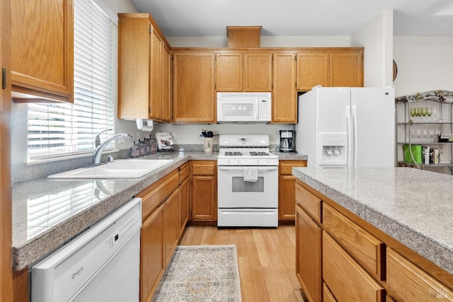 8724 Windsor Rd, Windsor, CA 95492 - kitchen with a sink, light wood finished floors, and white appliances