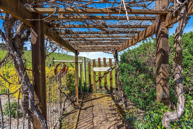view of patio featuring a pergola