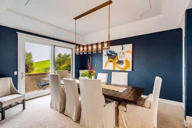 dining area featuring carpet