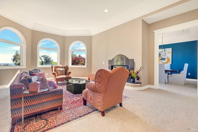 living area featuring ornamental molding, carpet flooring, and baseboards