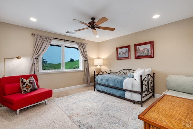 carpeted bedroom featuring recessed lighting, visible vents, and baseboards