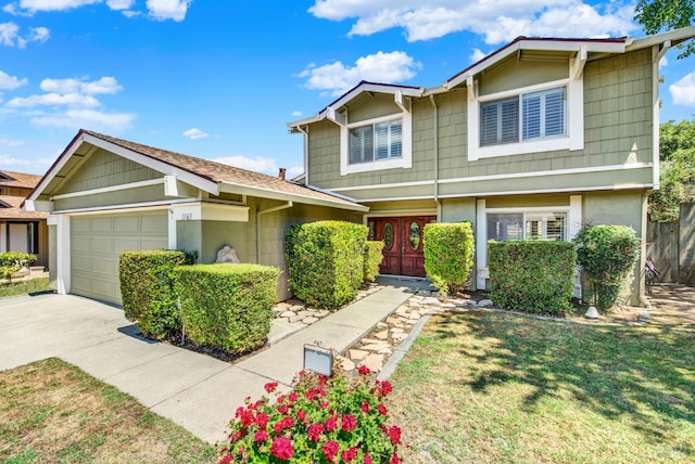 1163 Granada St, Vallejo, CA 94591 - view of front of house with an attached garage, concrete driveway, a front lawn, and stucco siding