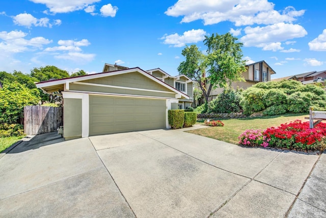 1163 Granada St, Vallejo, CA 94591 - view of front of property featuring concrete driveway, an attached garage, and stucco siding
