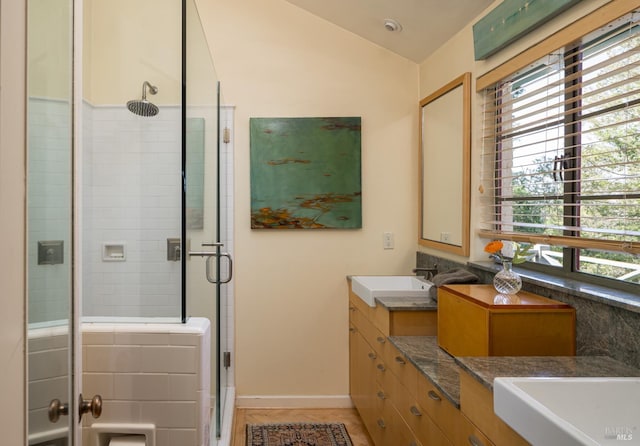 2480 Spring Mountain Rd, Saint Helena, CA 94574 - full bath with plenty of natural light, double vanity, a stall shower, vaulted ceiling, and tile patterned floors