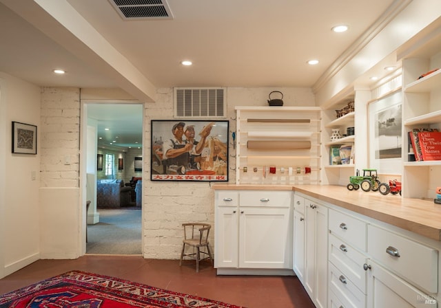 2480 Spring Mountain Rd, Saint Helena, CA 94574 - kitchen with open shelves, white cabinets, recessed lighting, and dark tile patterned flooring