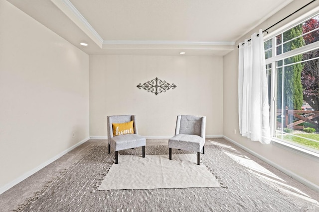 sitting room featuring baseboards, recessed lighting, carpet, and crown molding