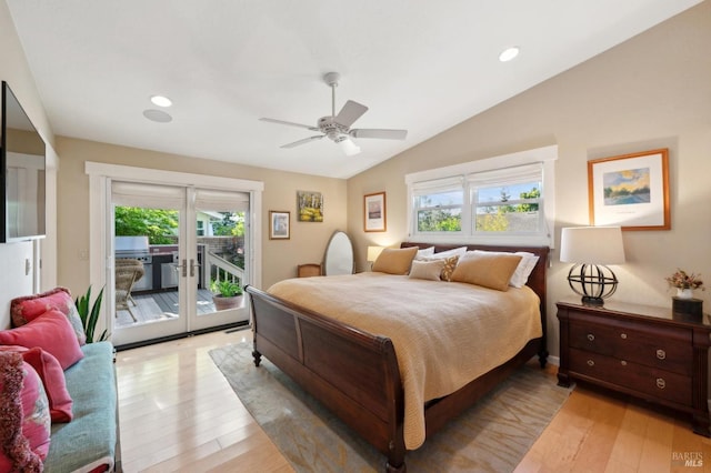 bedroom featuring recessed lighting, lofted ceiling, light wood-type flooring, and access to exterior