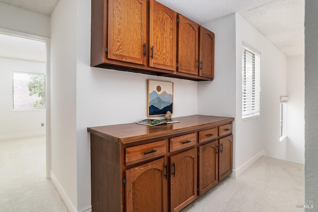 728 Walnut Ct, Novato, CA 94945 - hallway featuring light carpet, baseboards, and a textured ceiling