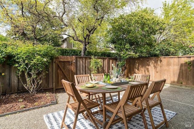 728 Walnut Ct, Novato, CA 94945 - view of patio with outdoor dining area and a fenced backyard