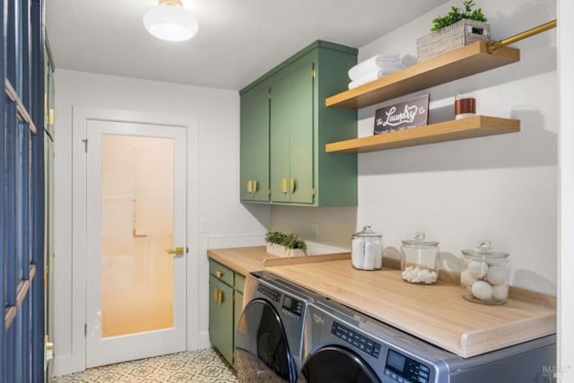 laundry room featuring washer and dryer and cabinet space