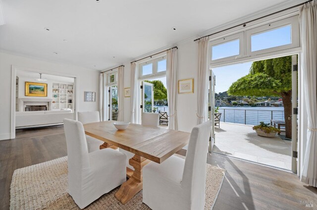 72 Lagoon Rd, Belvedere, CA 94920 - dining area with wood finished floors and a baseboard heating unit