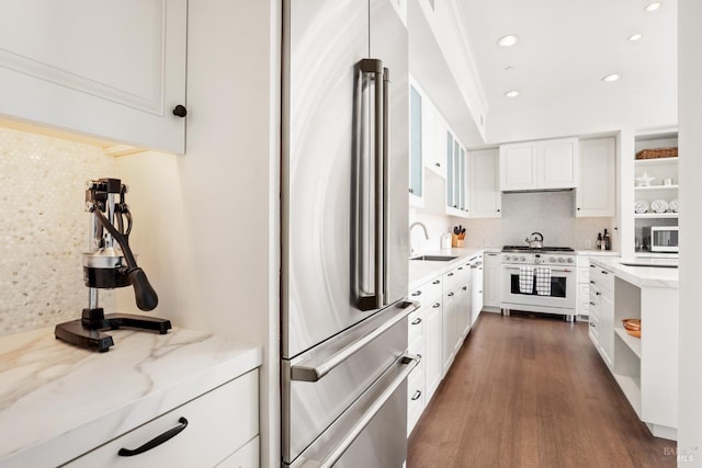 72 Lagoon Rd, Belvedere, CA 94920 - kitchen featuring open shelves, high quality appliances, a sink, light stone countertops, and white cabinets